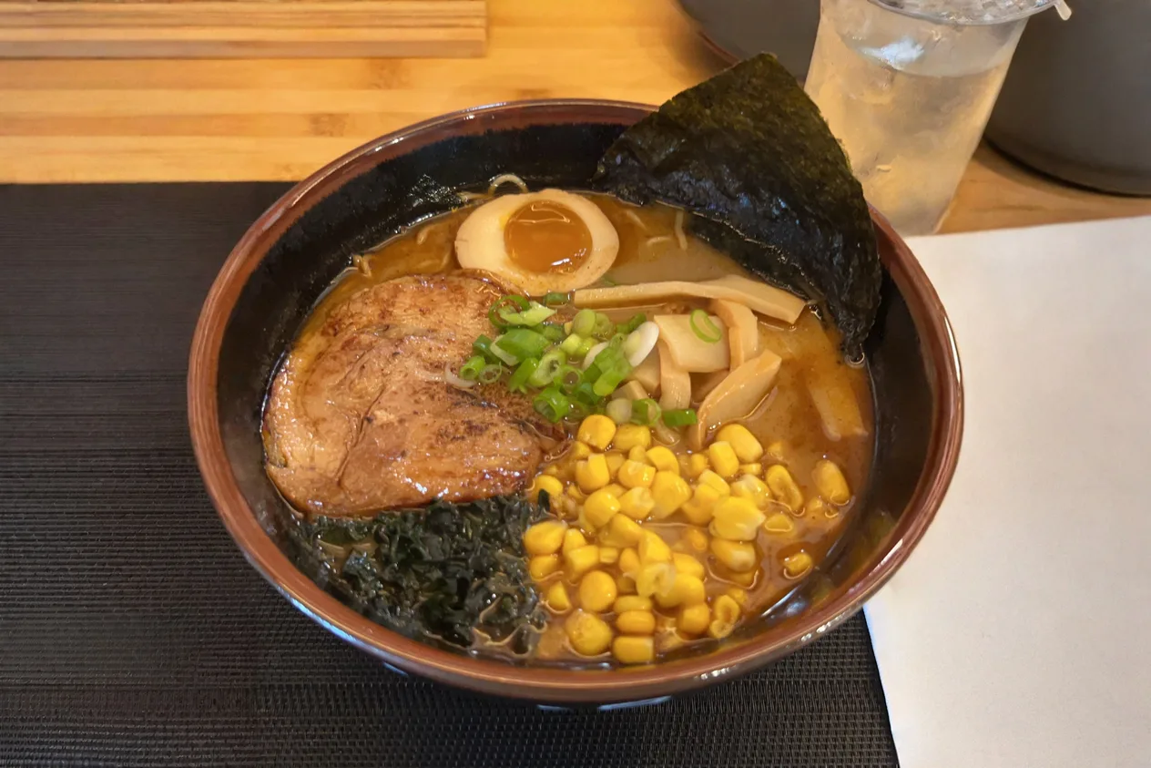 Before: a bowl of ramen as photographed on a phone